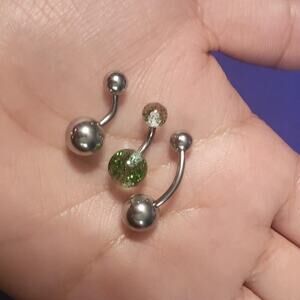 Green and silver belly ring